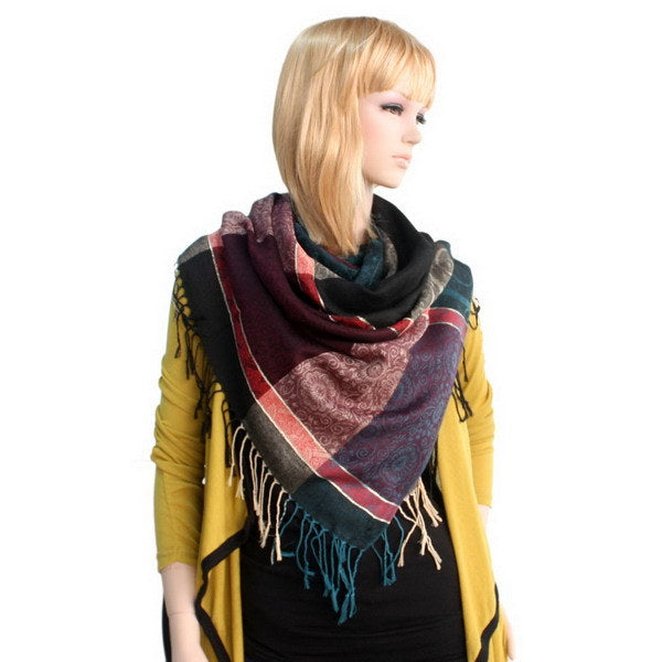 Pashmina scarf worn around neck, burgundy and teal plaid pattern with fringe