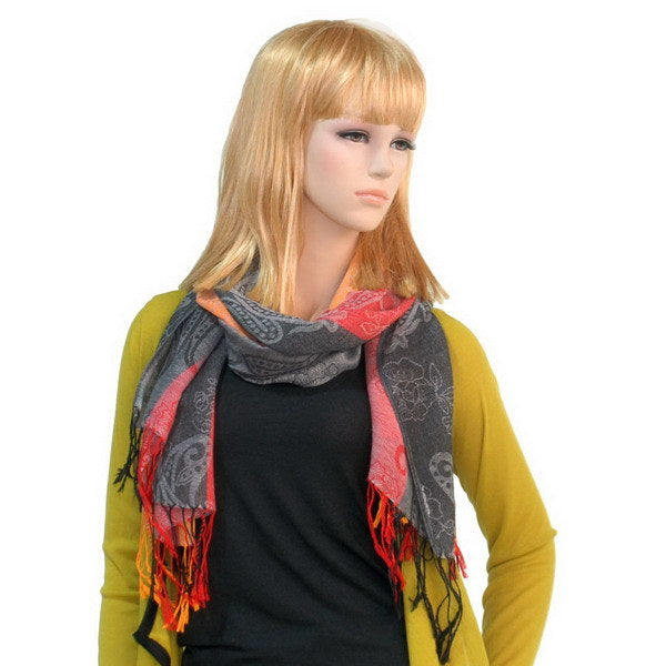 Paisley pashmina shawl draped on model; multicolor stripes with gray and red fringe