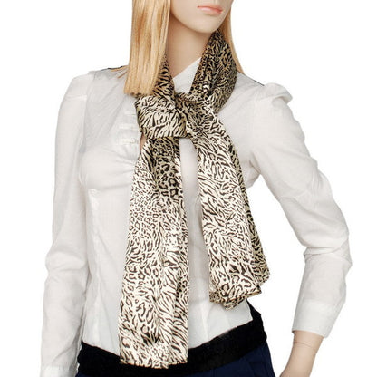 Leopard and zebra print scarf tied at the neck in cream and dark brown