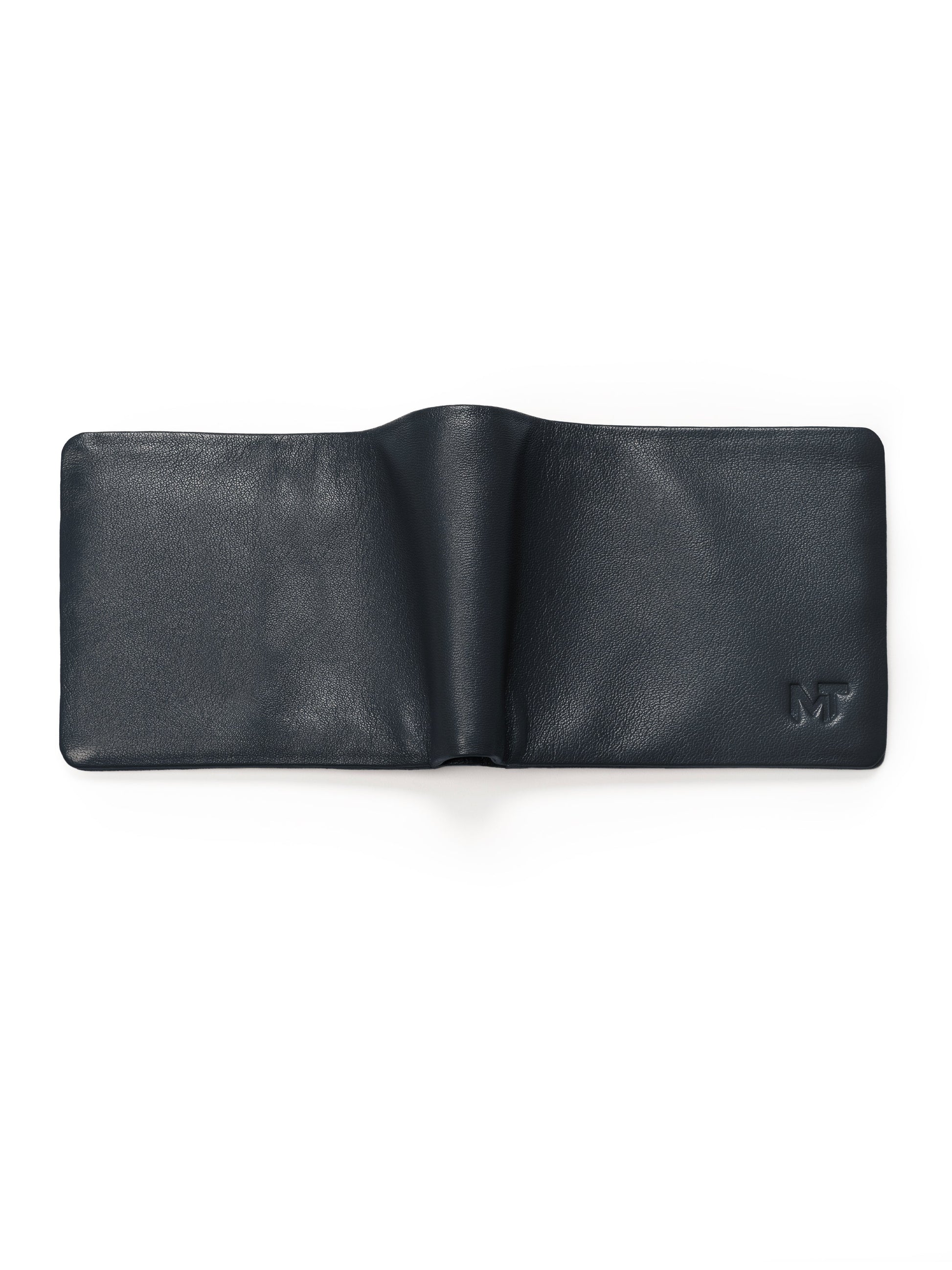 Dark blue leather bifold wallet opened flat, showing interior panels