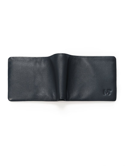 Dark blue leather bifold wallet opened flat, showing interior panels
