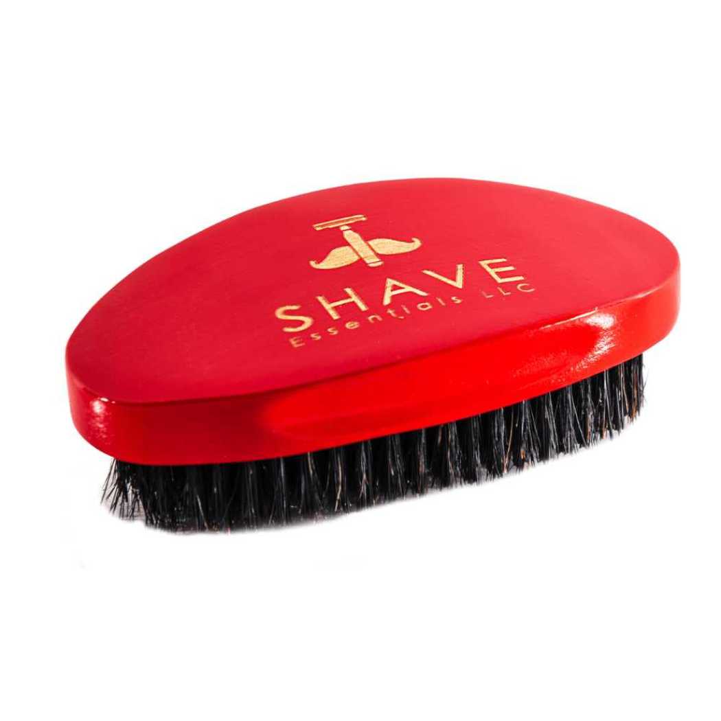 Boar bristle hair brush, red oval head with black bristles; CHANEL logo