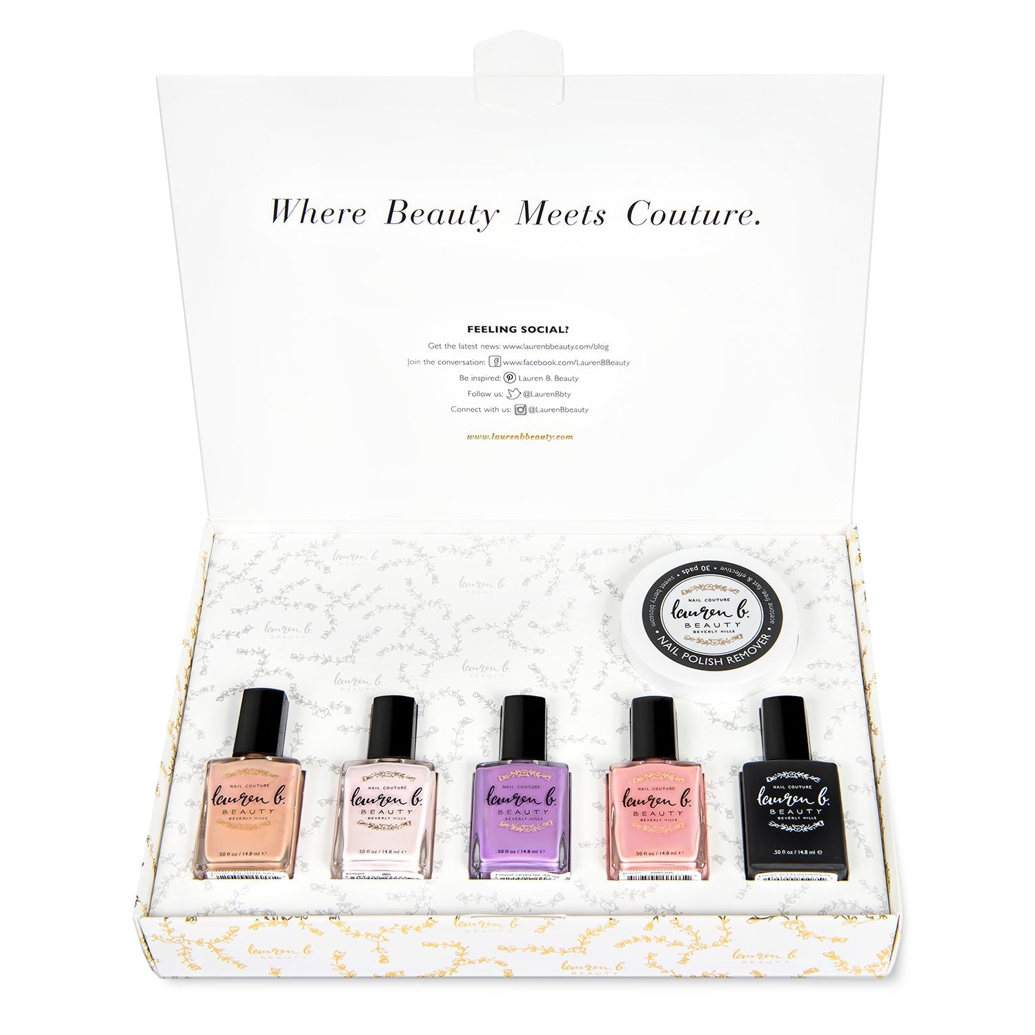 At-home nail polish set in open box with five bottles and round lid