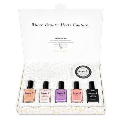 At-home nail polish set in open box with five bottles and round lid