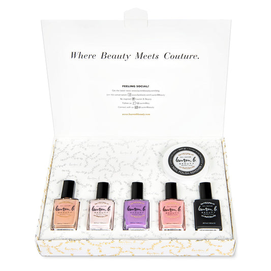 At-home nail polish set in open box with five bottles and round lid