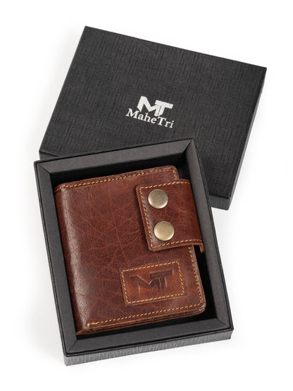 Brown leather card wallet in gift box, with MT logo and two snap buttons
