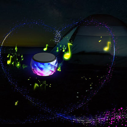 Mini LED Bluetooth speaker with multicolor light and music-note effect