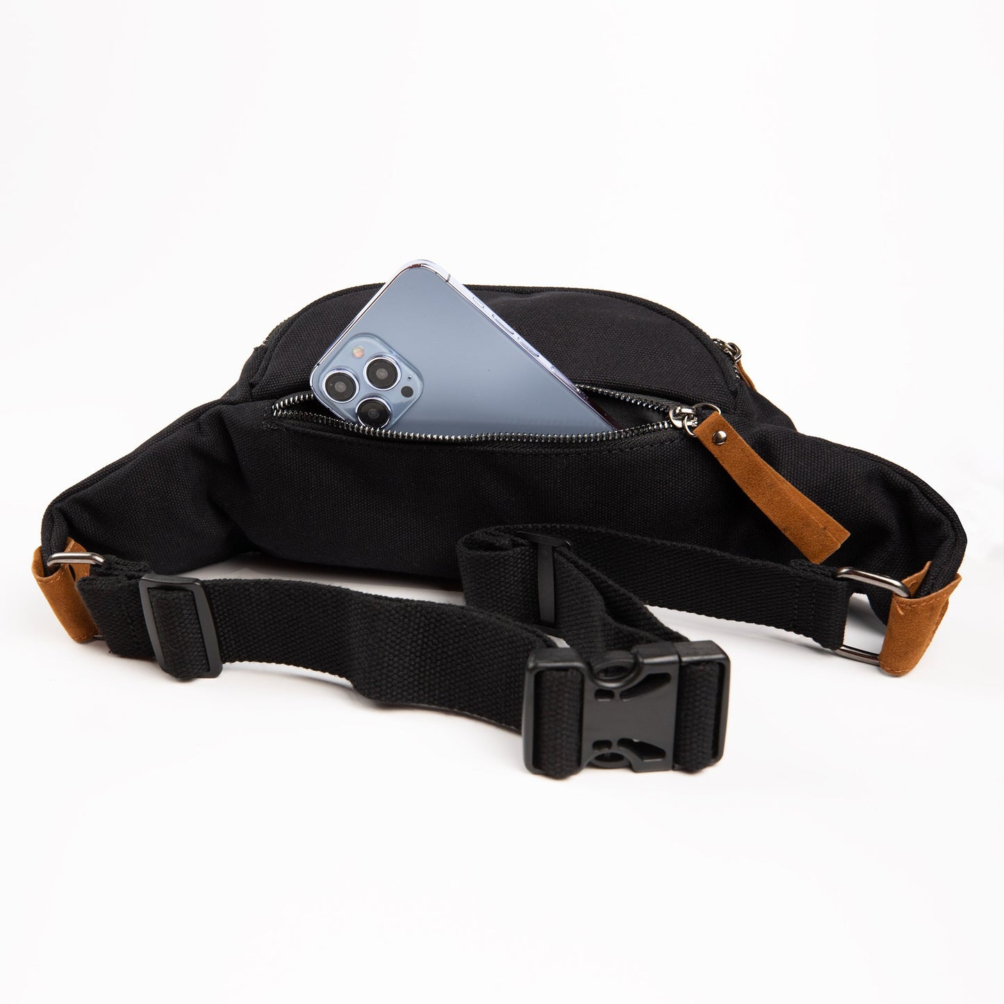 Canvas crossbody fanny pack, black; open pocket with phone and adjustable strap