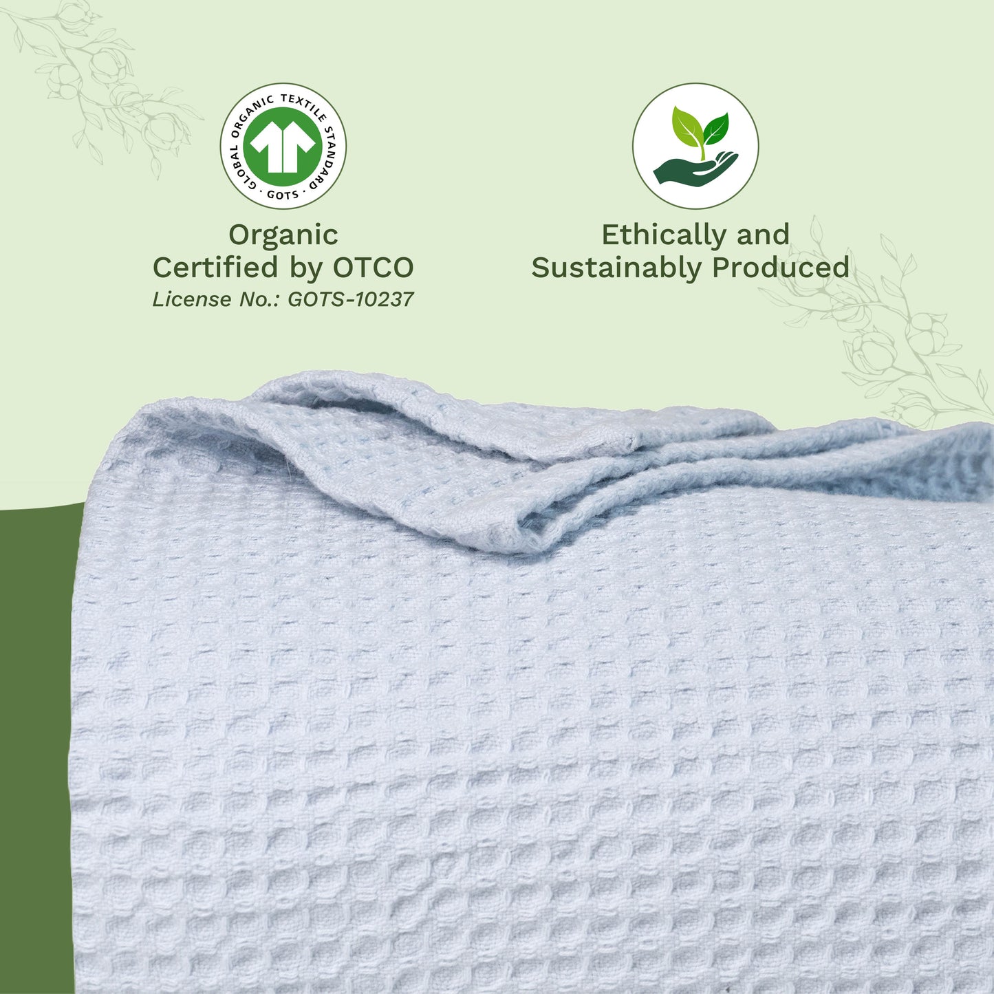 Waffle weave blanket, light blue folded with textured grid surface
