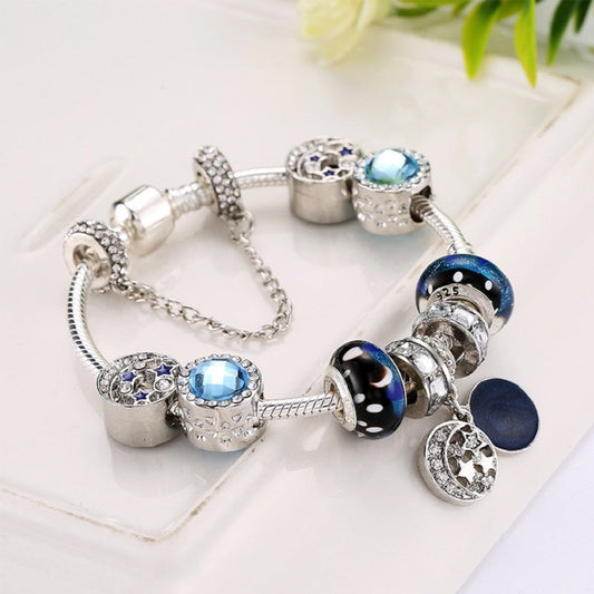Charm Bracelet Silver-Tone Glass Crystal Beads Star Charm Blue Black Half Moon Dangling Charm - Renee Lane Company