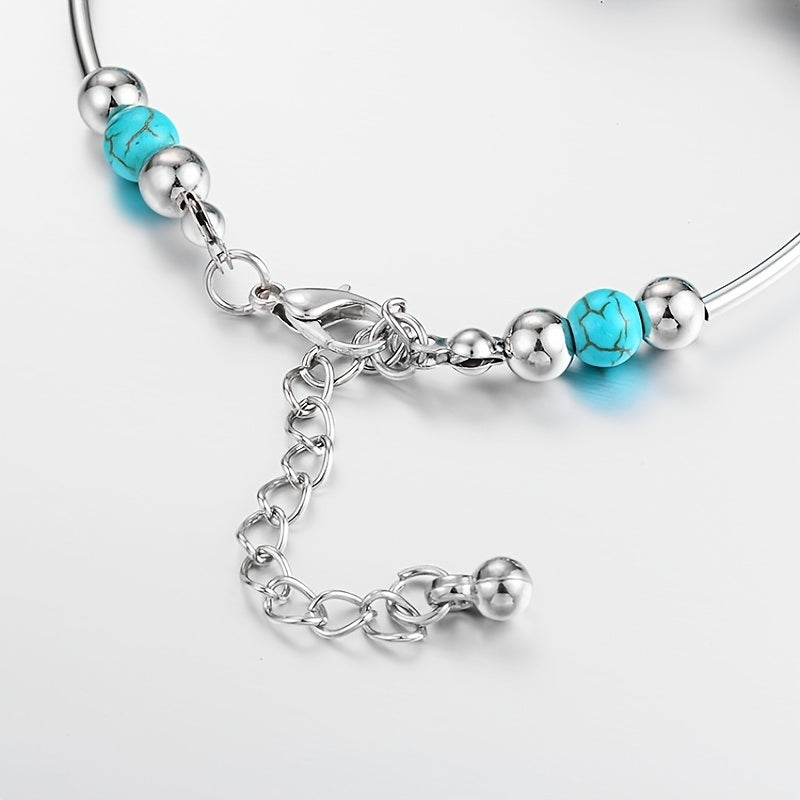 Silver-tone turquoise bead bracelet close-up of chain links and clasp