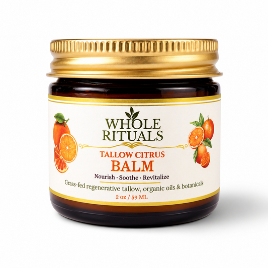 Tallow citrus balm jar with gold lid and amber balm contents, Whole Rituals label front