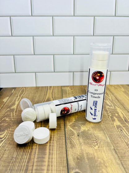 Compressed bamboo towel tube with white towel discs and tablets