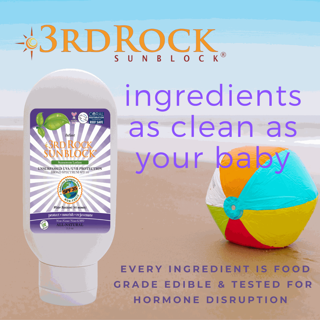 Infant sunscreen bottle with purple label and sunblock graphic.