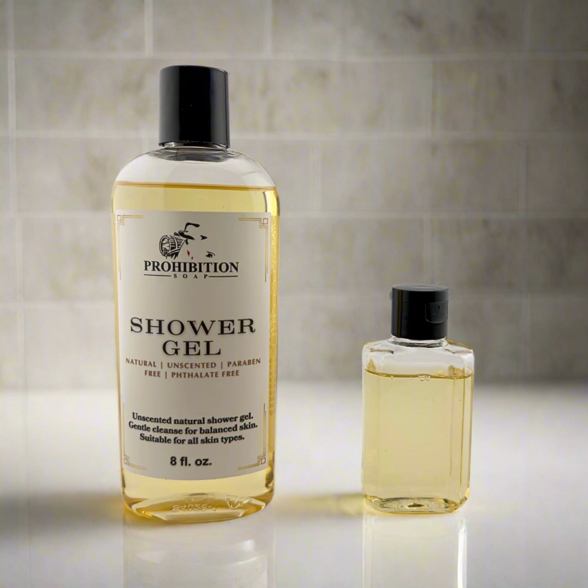 Prohibition Soap shower gel bottle with black pump cap, plus smaller bottle with amber liquid.