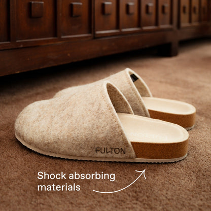 Beige house shoe pair with tan lining and cushioned slip-on sole