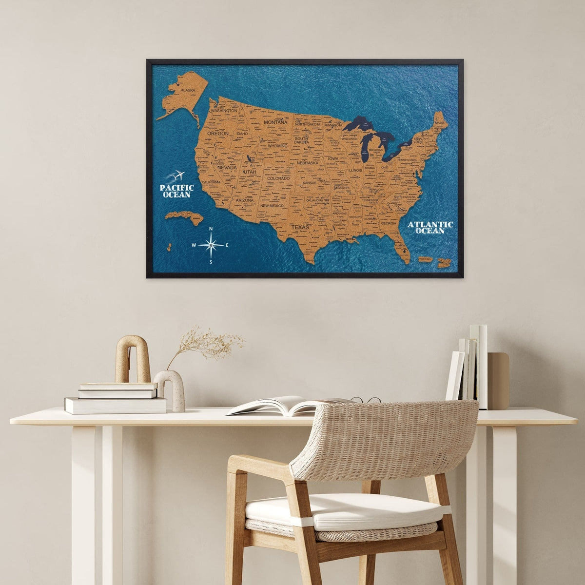 Framed cork wall map of the United States with blue ocean background and labeled states.