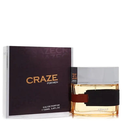 Men's eau de parfum bottle with black label and brown strap, paired with dark box
