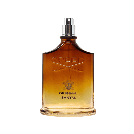 Creed Original Santal glass perfume bottle, amber liquid, silver cap with embossed logo