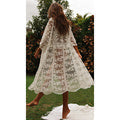 White crochet lace cover-up dress with textured knit and tiered skirt
