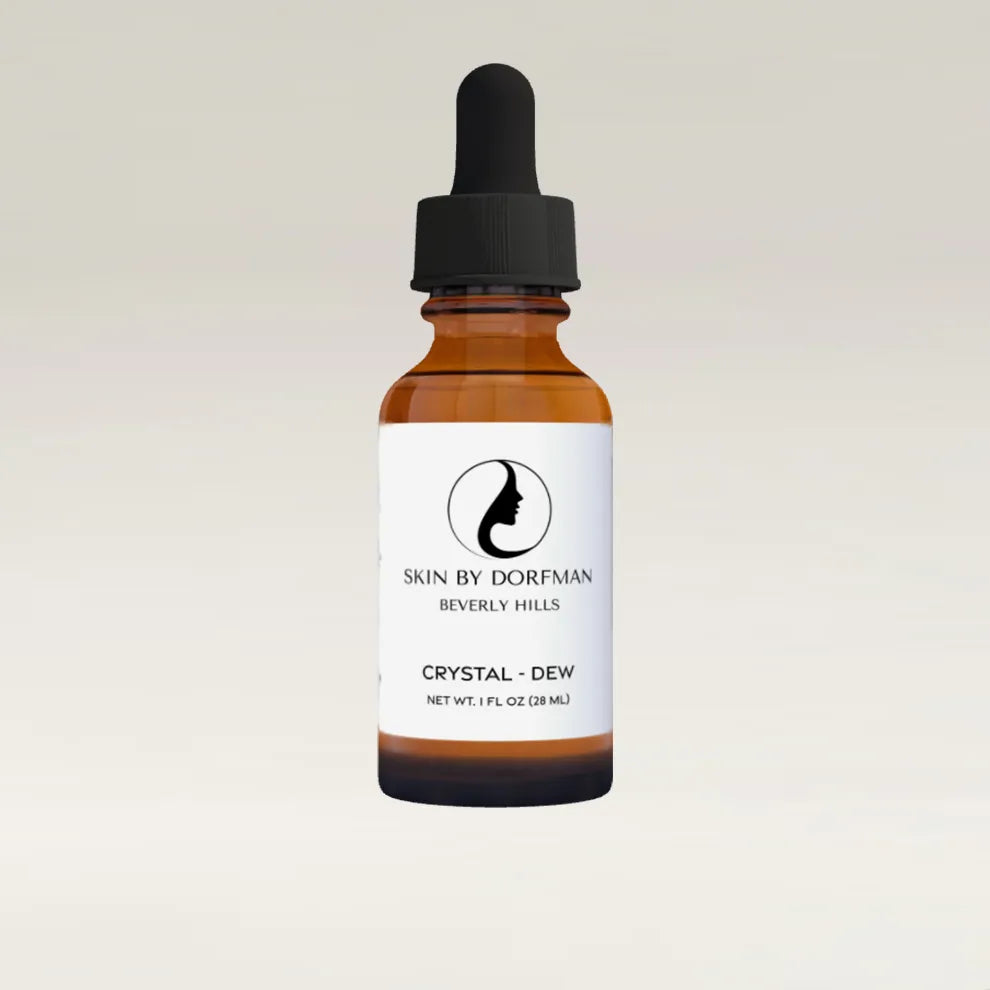 Hydrating serum bottle in amber glass with black dropper
