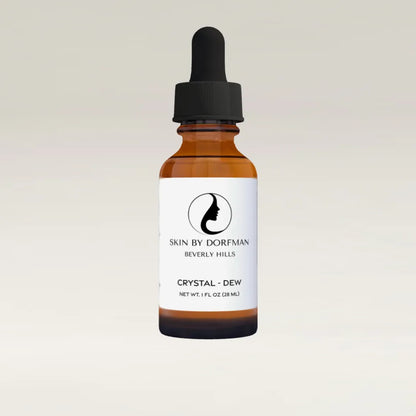 Hydrating serum bottle in amber glass with black dropper