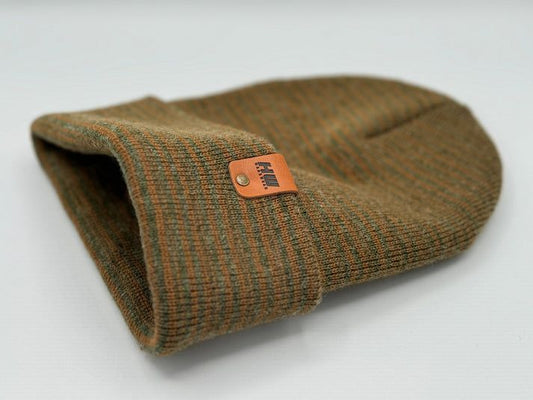 Cuffed knit beanie in dark green and brown with an orange logo patch