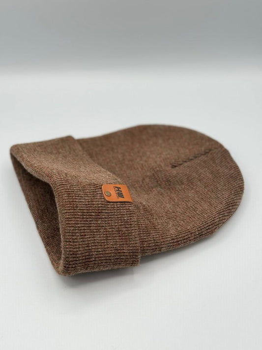 Cuffed knit beanie in dark brown with orange brand tag