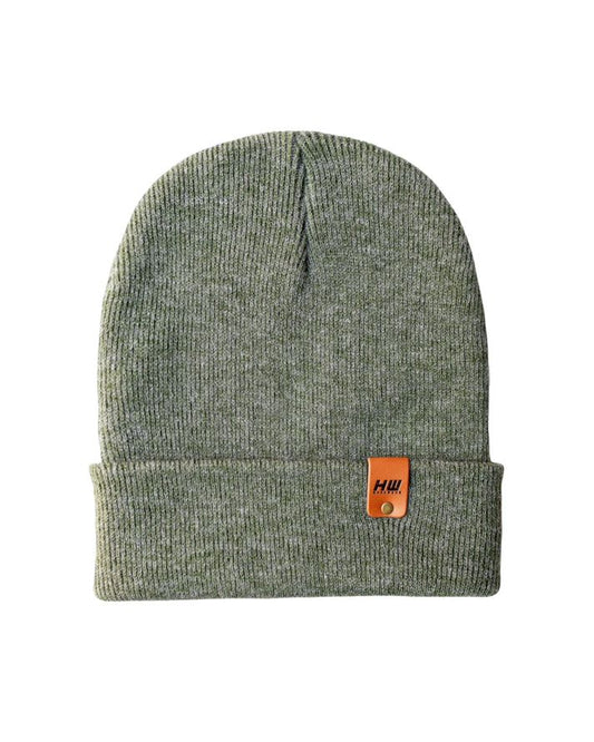 Cuffed knit beanie in dark forest green with fold-up brim and small logo patch