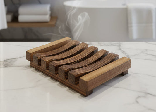Curved bamboo soap holder with slatted ridges for draining, rectangular tray