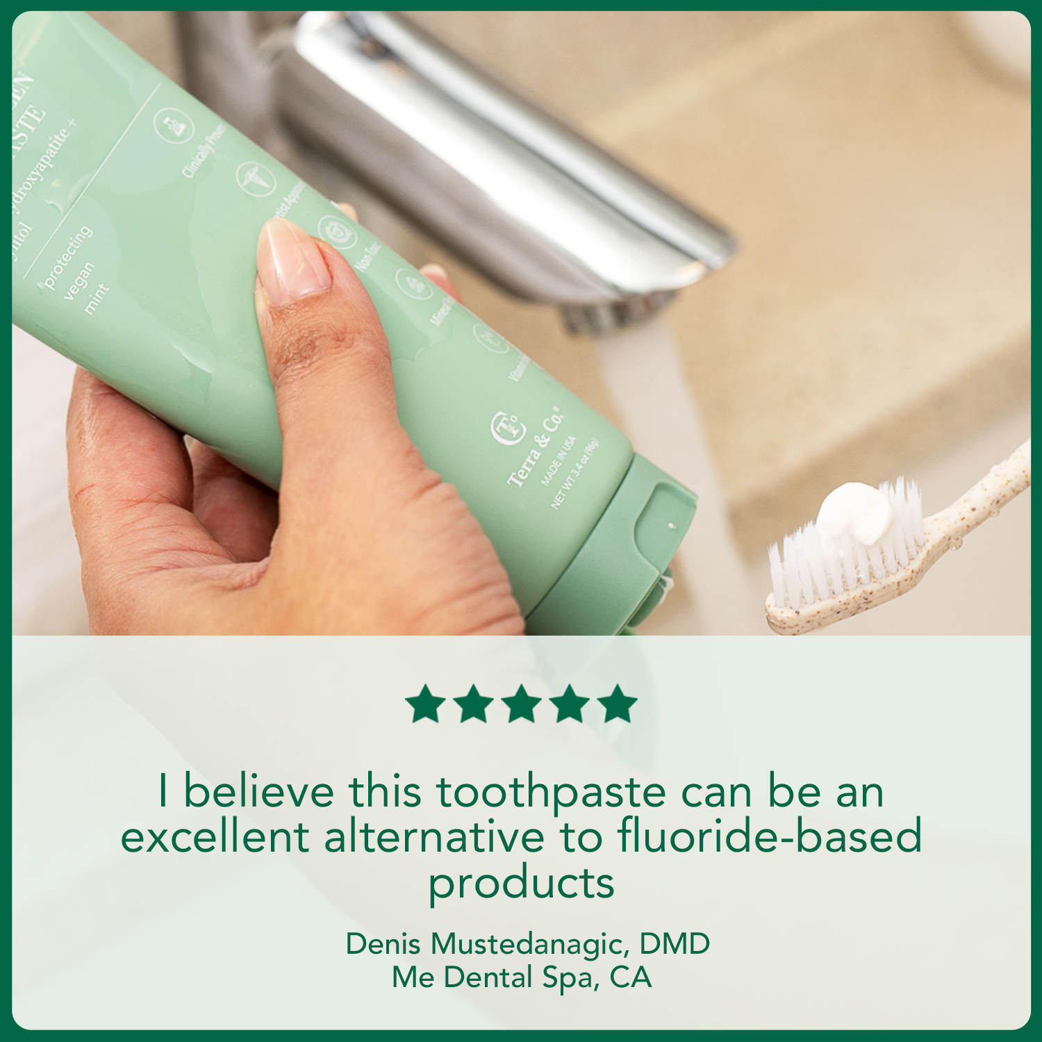 Toothpaste tube in hand next to a toothbrush, with a five-star testimonial card