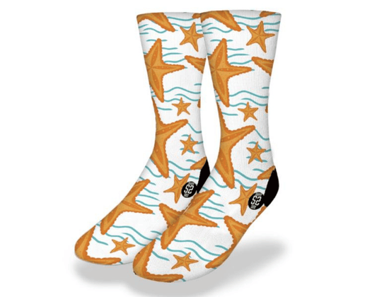 Sea life crew socks with repeating starfish and aqua wave lines on white; black heel/toe