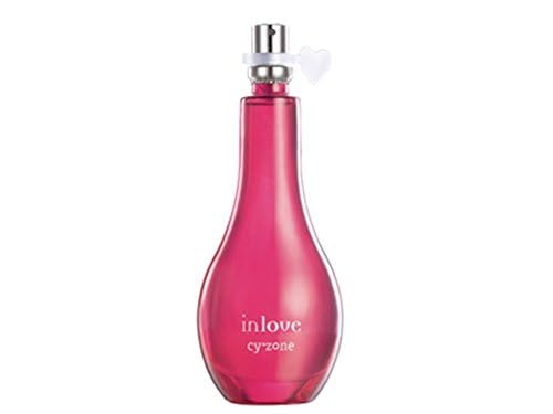 Eau de parfum bottle, dark pink glass with silver cap and white spray nozzle