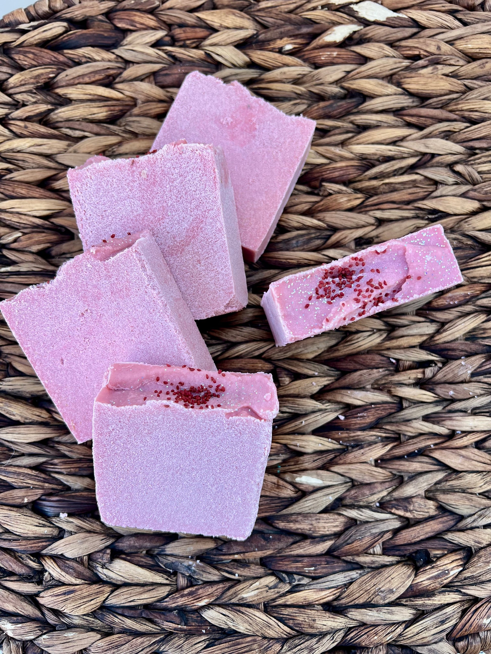 Sea salt soap bar, pink-purple with dark speckles, small cut pieces