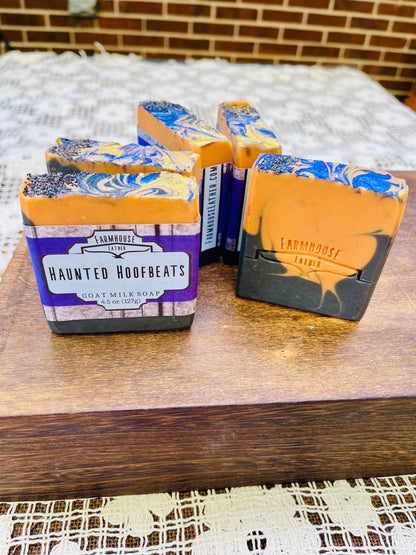 Scented soap bars with tan labels and blue swirl tops