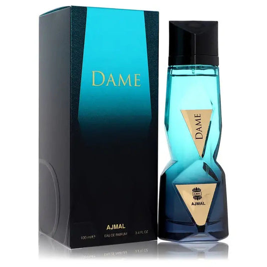 Perfume bottle and box set, black cap over turquoise flacon with gold DAMЕ emblem.