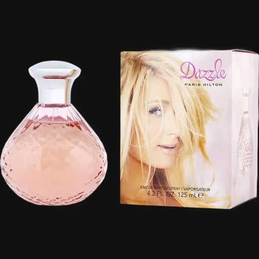 Dazzle by Paris Hilton women’s perfume bottle in pink faceted glass with white cap
