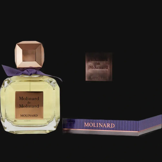 De Molinard by Molinard women's perfume bottle with purple ribbon, square cap