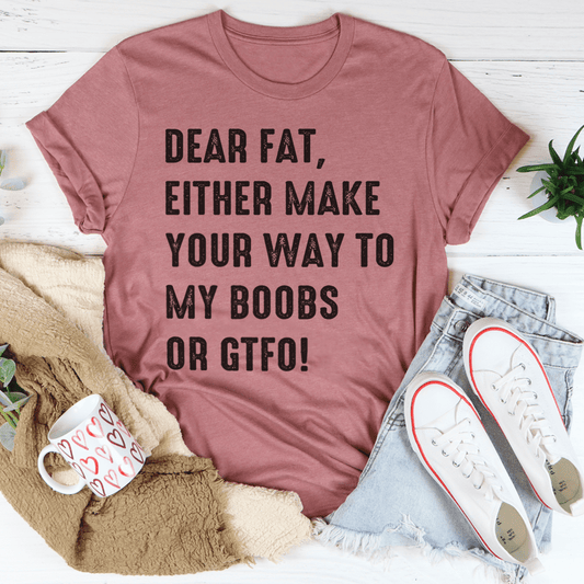 Mauve T-shirt with bold black "DEAR FAT" slogan graphic on the chest