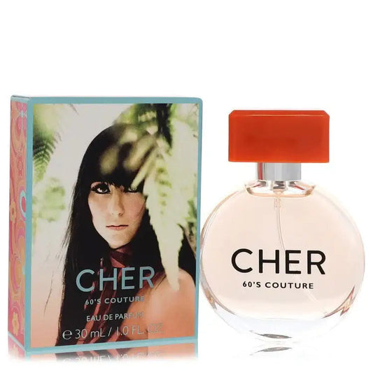 Women's Cher 60's Couture perfume bottle with orange cap, shown with gift box