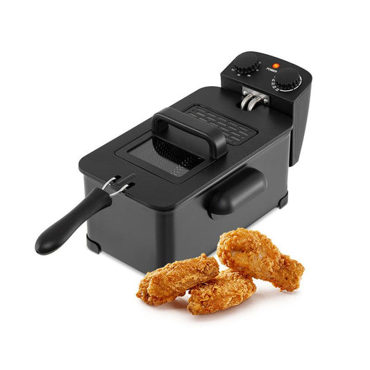 Deep fryer with viewing window, black handle, and frying basket; fries on countertop