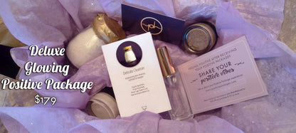Skincare gift package with bottles, jars, and two folded greeting cards