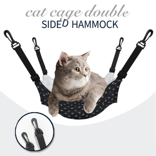 Hanging cat hammock with navy star fabric and black adjustable straps