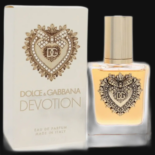 Women's Eau de Parfum bottle and box, gold heart emblem, clear glass with gold cap