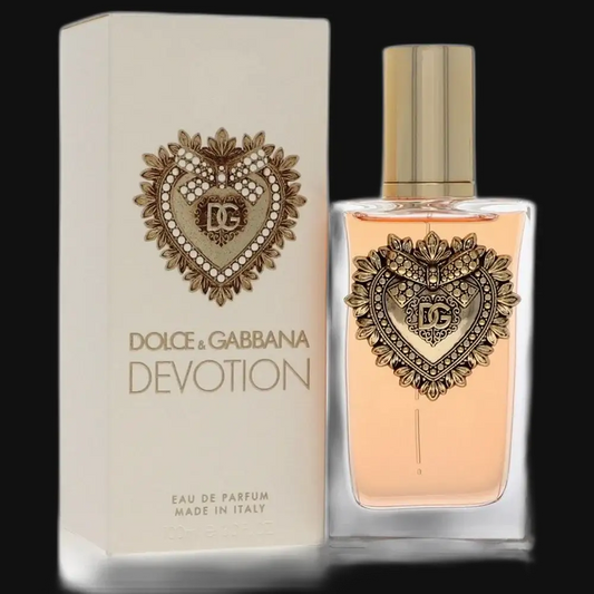 Women's Eau de Parfum bottle with gold heart crest on box, clear glass and gold cap
