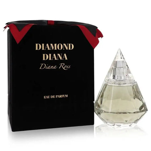 Women’s eau de parfum bottle with glass faceted shape, shown with black gift box and red ribbon
