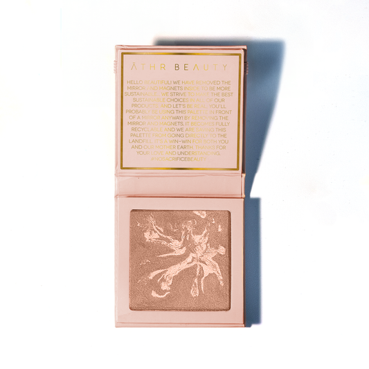 Bronzing powder compact with rose-pink case and shimmer bronze dancer pan