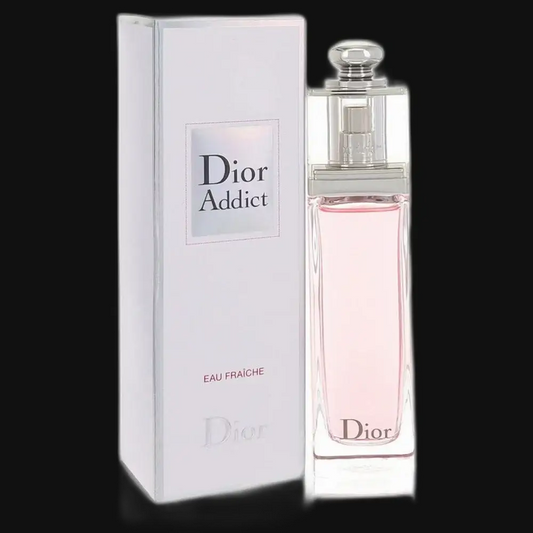 Women's Eau Fraîche perfume bottle with clear glass, silver cap, and pink liquid beside box
