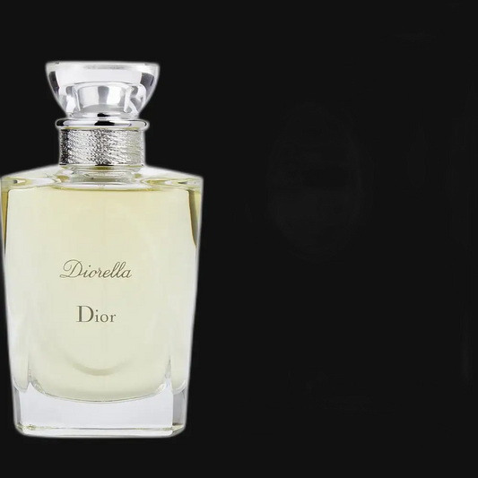 Women's Diorella perfume bottle with metallic cap, pale yellow glass, front label