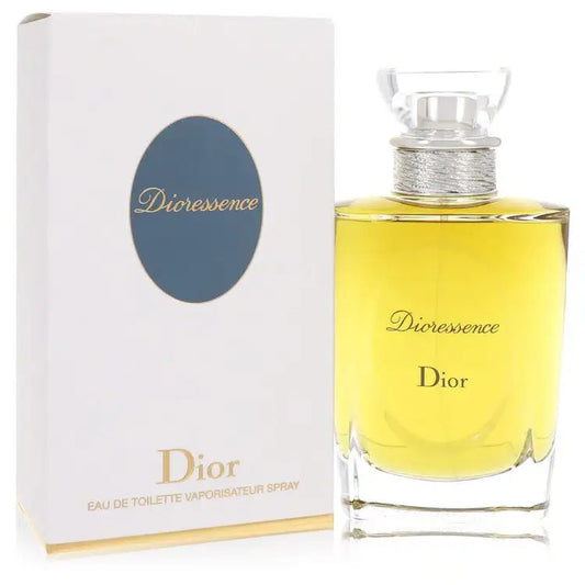 Women’s perfume set with white box and yellow bottle; gold cap and Dioressence label